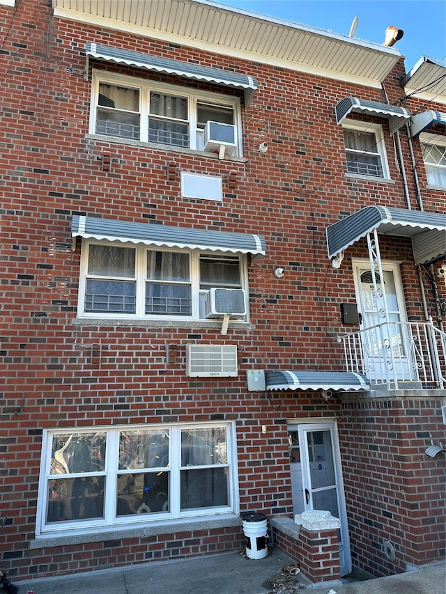 view of front of house with cooling unit