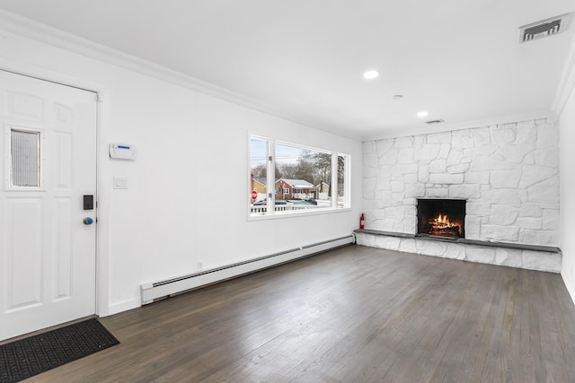 unfurnished living room featuring dark wood-style floors, a baseboard radiator, visible vents, ornamental molding, and a stone fireplace