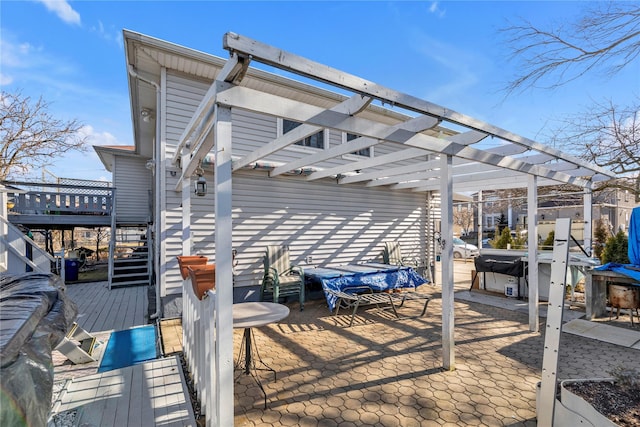 view of patio / terrace featuring a deck and a pergola