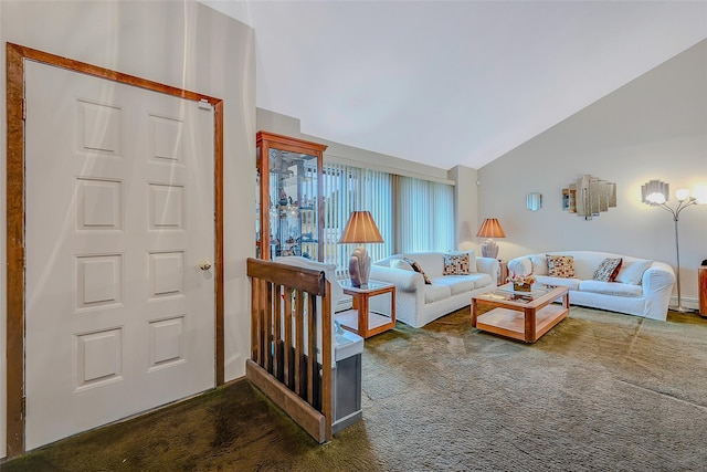 living room featuring dark carpet, a baseboard radiator, and vaulted ceiling