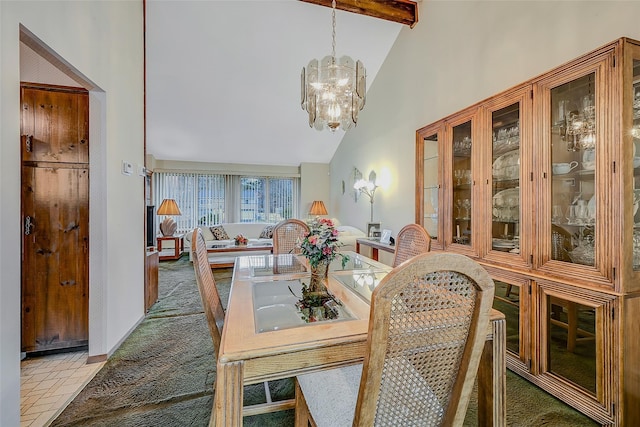 dining room featuring beam ceiling, high vaulted ceiling, light colored carpet, and a chandelier