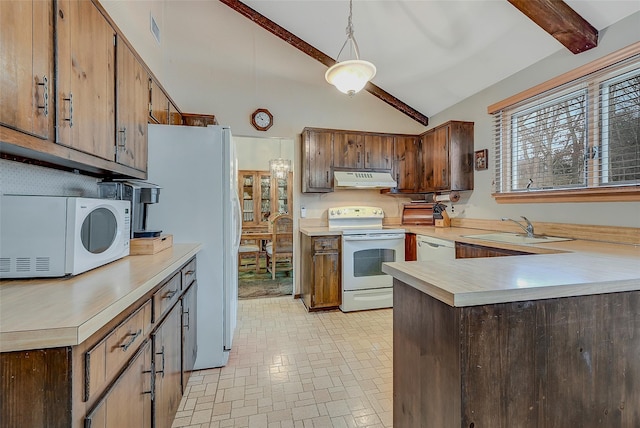 kitchen featuring decorative light fixtures, sink, white appliances, kitchen peninsula, and beam ceiling