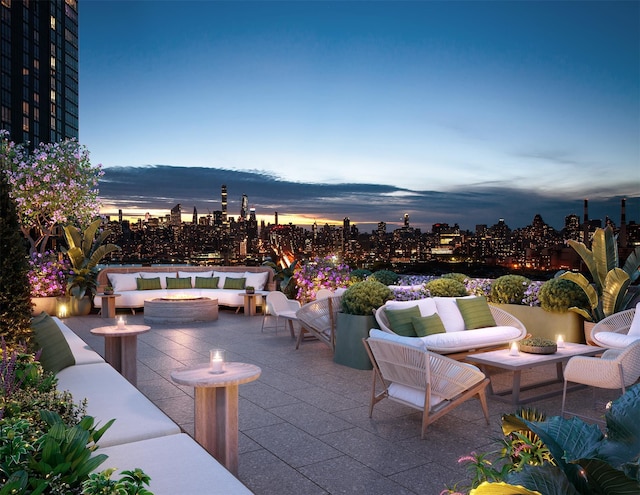 patio terrace at dusk with outdoor lounge area