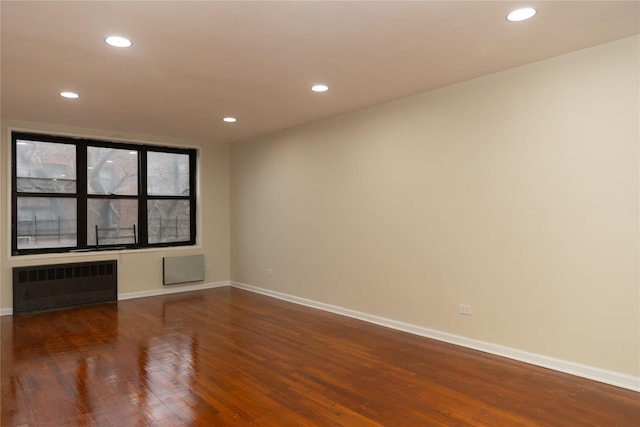 1275 E 51st St Unit 3Y, Brooklyn, NY 11234 - empty room with radiator and dark wood-type flooring