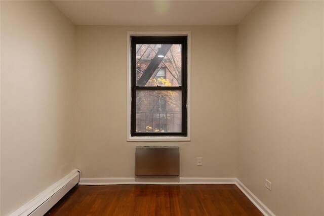 1275 E 51st St Unit 3Y, Brooklyn, NY 11234 - spare room with dark hardwood / wood-style floors and baseboard heating