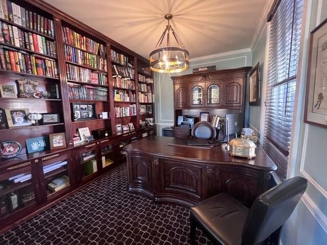 home office featuring an inviting chandelier and crown molding