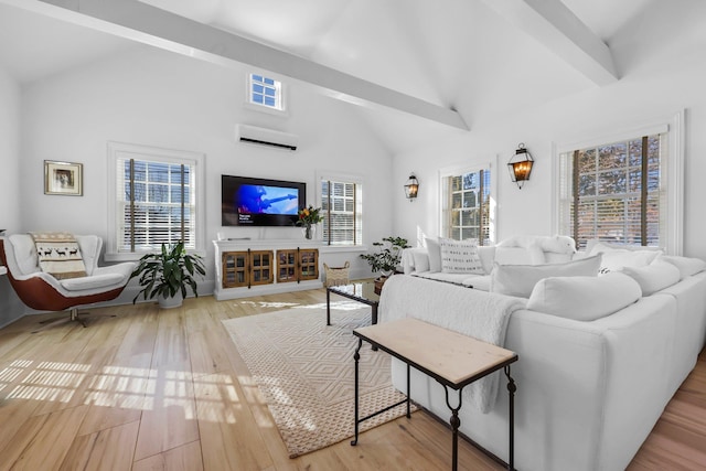 living room featuring beam ceiling, high vaulted ceiling, an AC wall unit, and wood finished floors