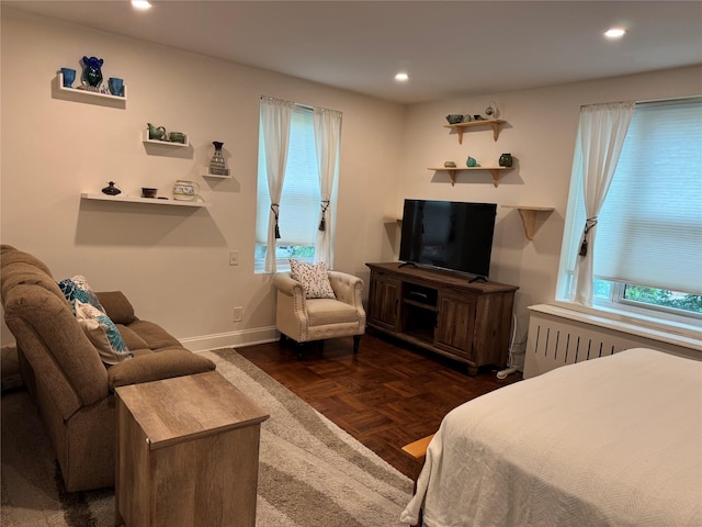 555 Broadway Ave Unit 1H, Hastings-On-Hudson, NY 10706 - bedroom with radiator, multiple windows, and recessed lighting