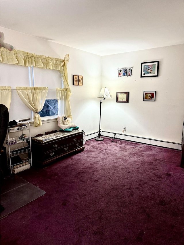 sitting room featuring carpet and baseboard heating