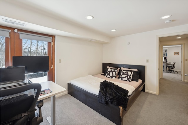 bedroom featuring light carpet, baseboards, visible vents, and recessed lighting