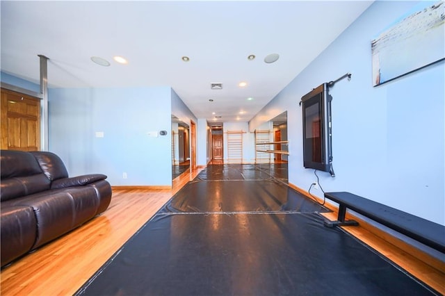 playroom with hardwood / wood-style floors