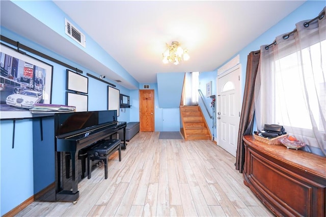 sitting room with light hardwood / wood-style floors