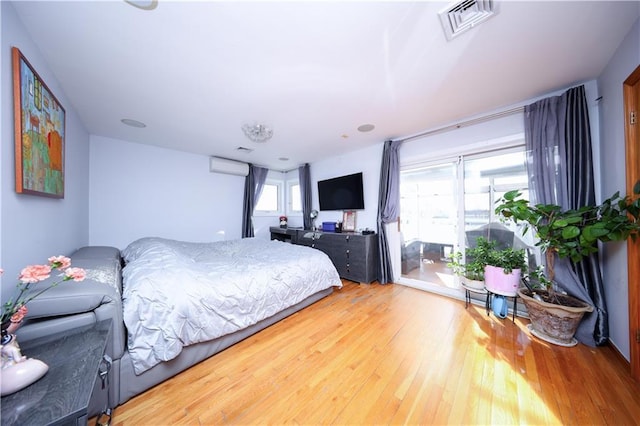 bedroom featuring hardwood / wood-style flooring