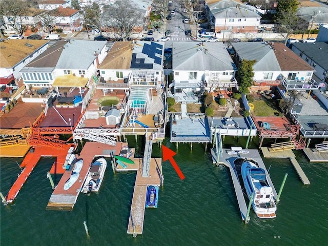 bird's eye view with a water view