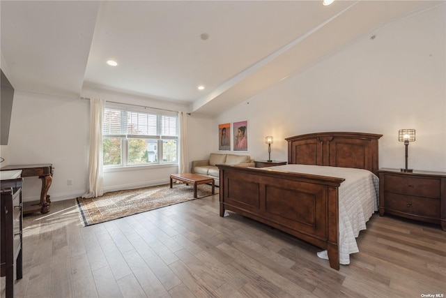 bedroom with light hardwood / wood-style flooring