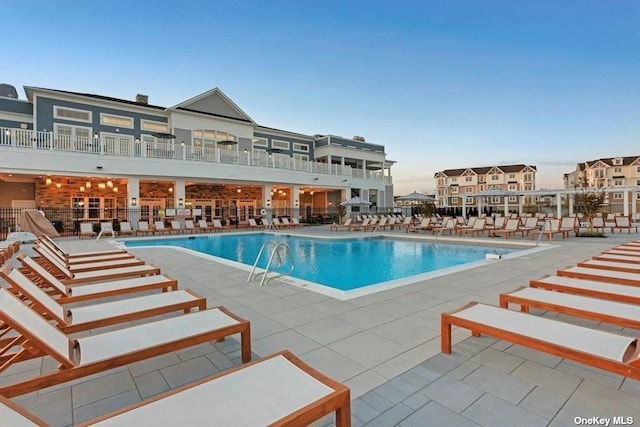 view of pool featuring a patio