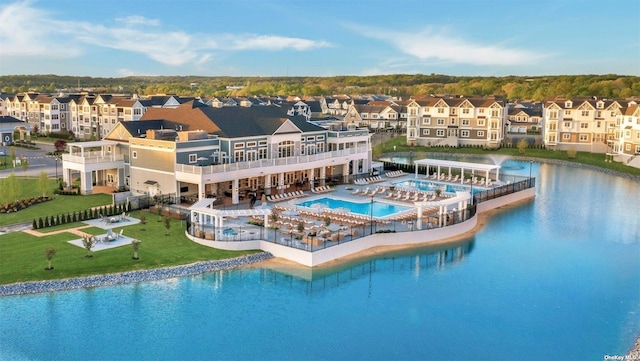 view of pool with a water view