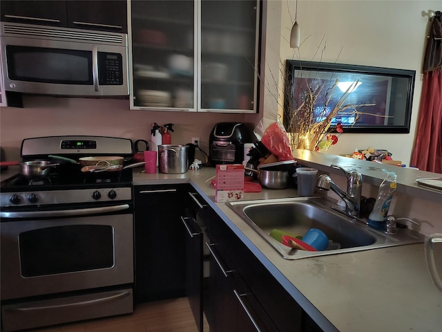 kitchen featuring sink and appliances with stainless steel finishes