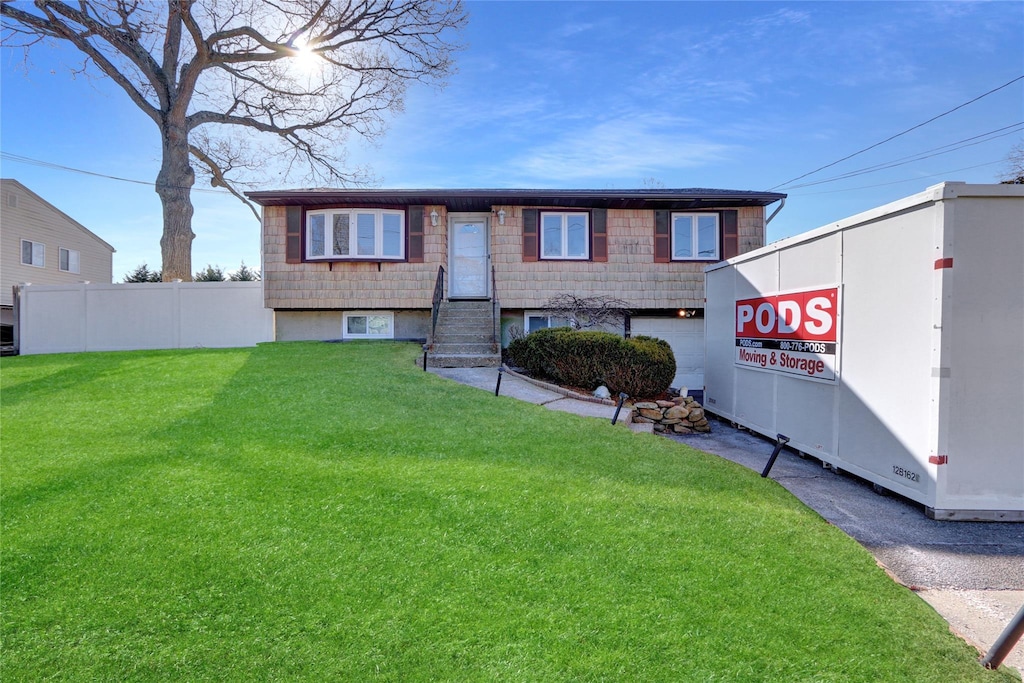 view of front of house with a front lawn