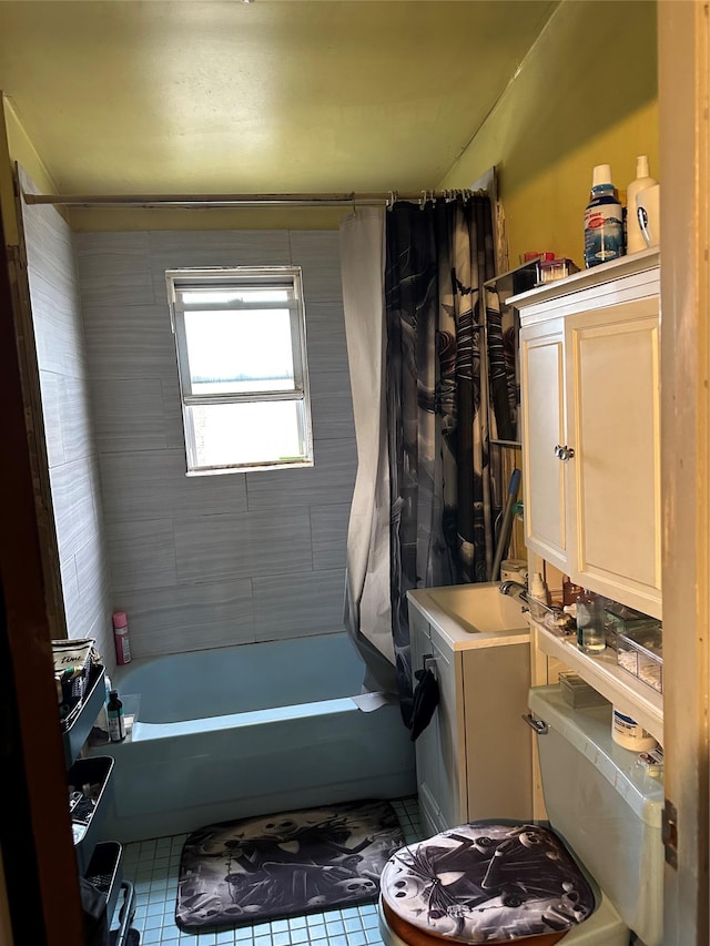 11551 209th St, Cambria Heights, NY 11411 - bathroom with tile patterned floors, vanity, and shower / bath combo with shower curtain