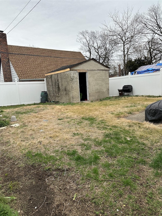 11551 209th St, Cambria Heights, NY 11411 - view of yard featuring an outbuilding and fence