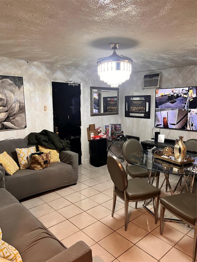 200-21 Hollis Ave, Saint Albans, NY 11412 - living room with light tile patterned floors, a wall unit AC, and a textured ceiling