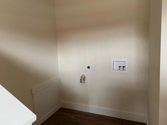 laundry room with electric dryer hookup, washer hookup, and dark hardwood / wood-style floors