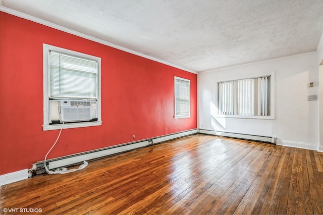 empty room featuring baseboard heating, cooling unit, wood-type flooring, and a textured ceiling