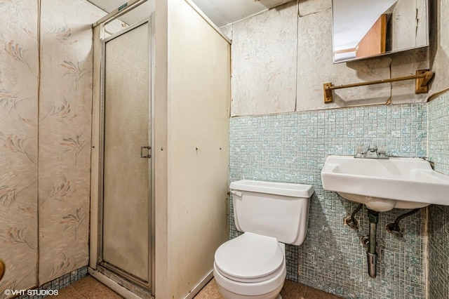 bathroom with sink, tile patterned flooring, and toilet