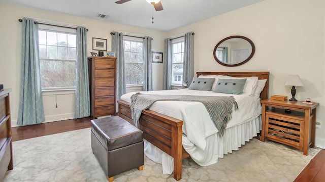 bedroom featuring hardwood / wood-style flooring and ceiling fan