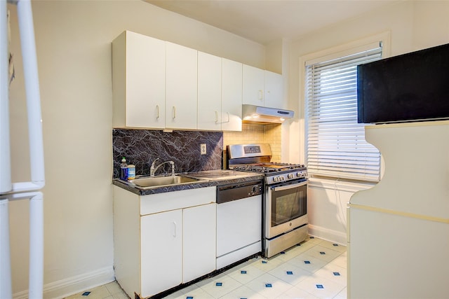 kitchen featuring tasteful backsplash, sink, white cabinets, white dishwasher, and gas range