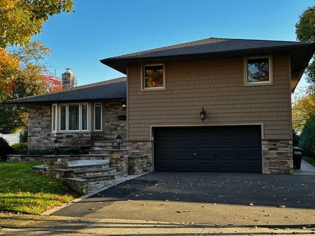 tri-level home featuring a garage