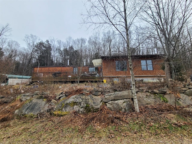 view of front of property with a deck