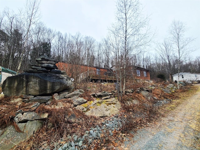 view of yard with a wooden deck