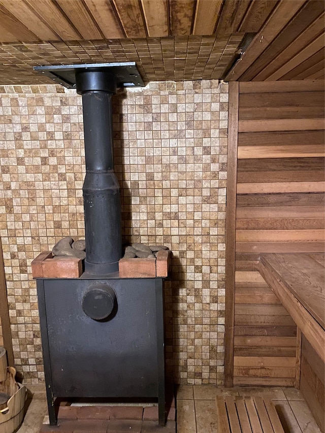 interior details featuring a wood stove