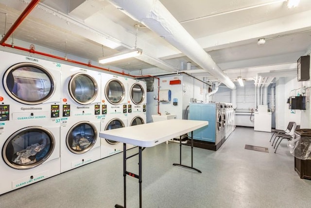 laundry room with independent washer and dryer and stacked washing maching and dryer