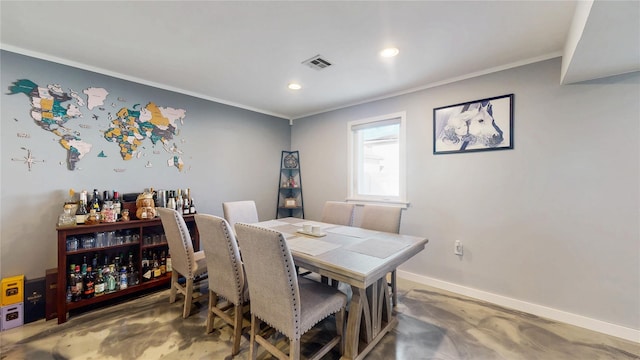 dining room with baseboards, concrete floors, visible vents, and recessed lighting