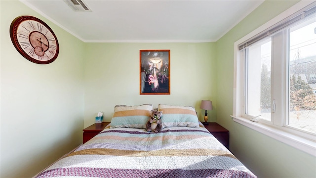 bedroom with visible vents