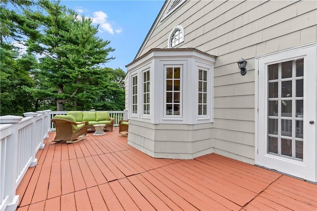 deck featuring an outdoor living space