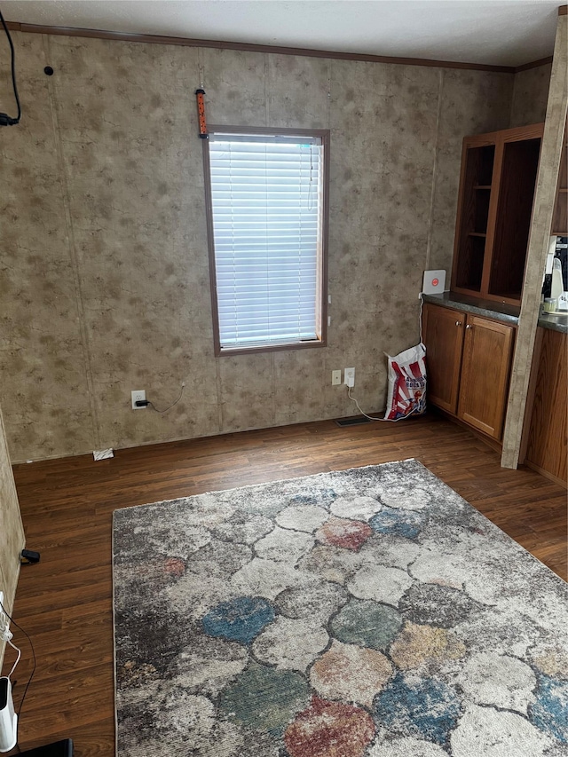 empty room featuring wood finished floors