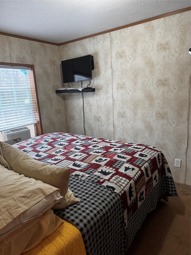 carpeted bedroom featuring a textured ceiling, ornamental molding, and cooling unit