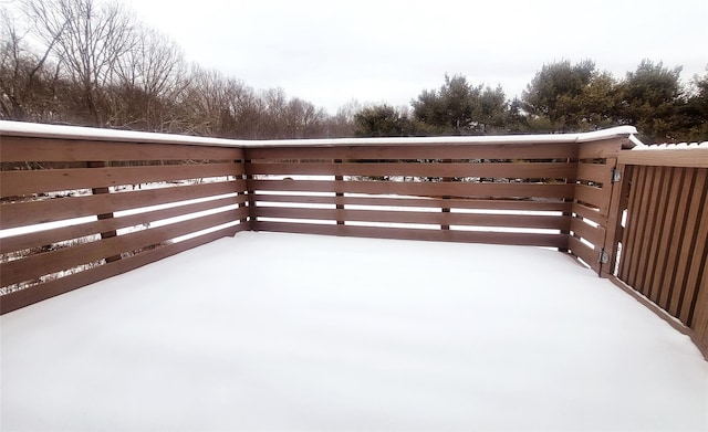 view of snow covered deck