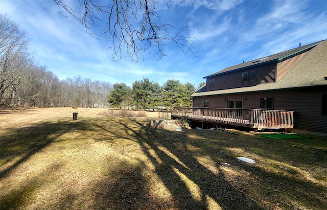 view of yard featuring a deck