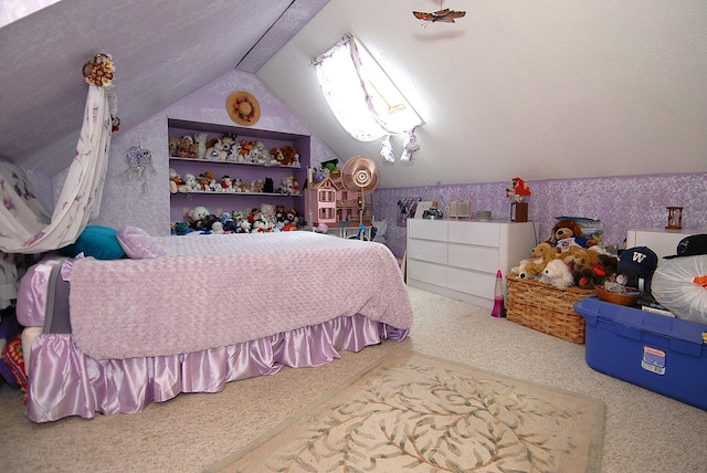 carpeted bedroom with wallpapered walls and lofted ceiling