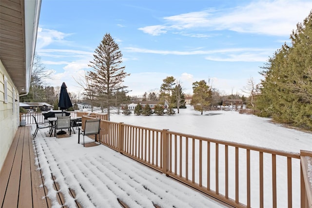 view of snow covered deck