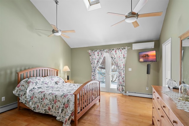 bedroom featuring a wall unit AC, access to outside, vaulted ceiling with skylight, and a baseboard radiator