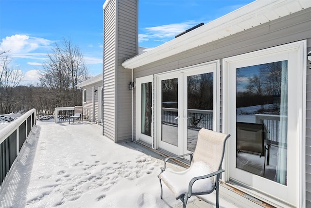 view of snow covered deck