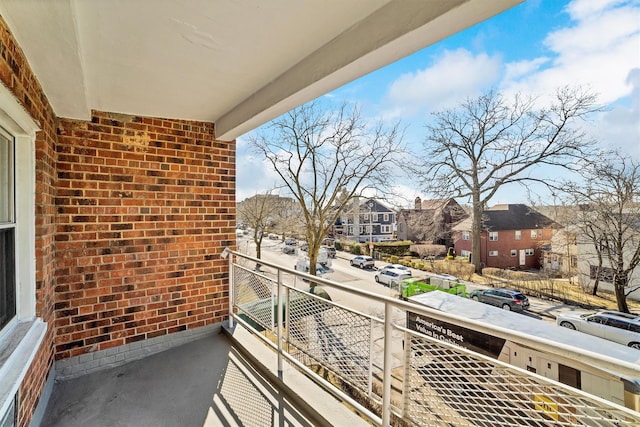 balcony featuring a residential view