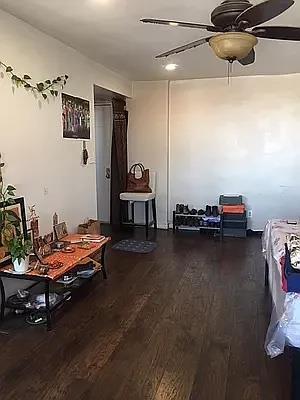 misc room featuring ceiling fan and hardwood / wood-style floors