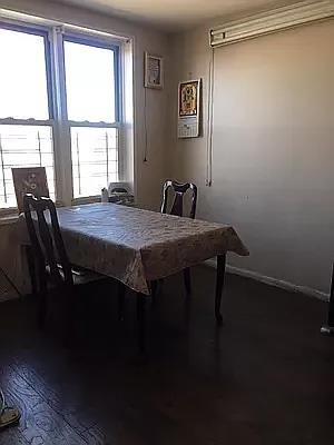 dining room featuring hardwood / wood-style flooring